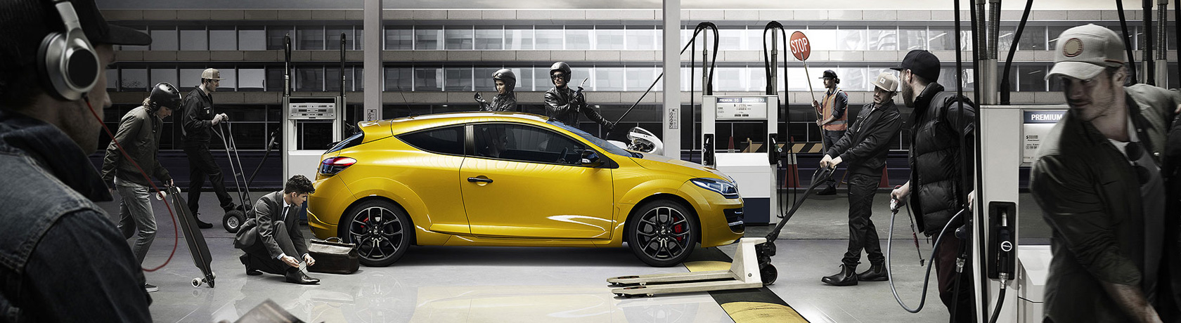 Renault Megane R.S in liquid yellow in a simulated racing pit stop.