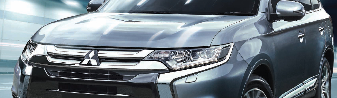 Close up of Mitsubishi Outlander in silver.