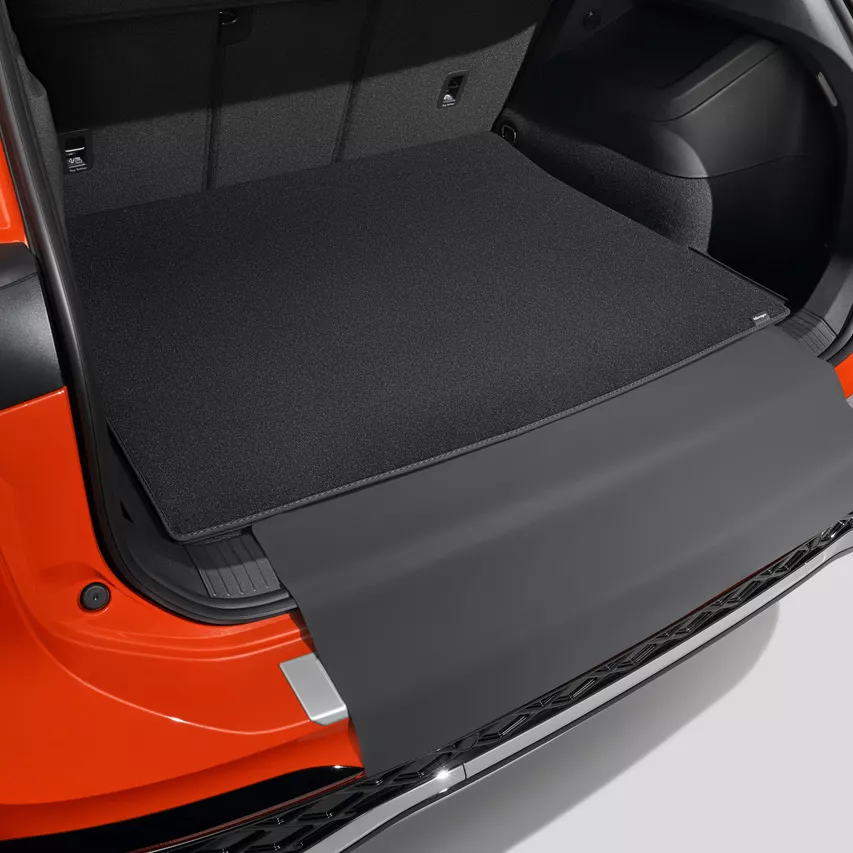 Reversible luggage compartment mat