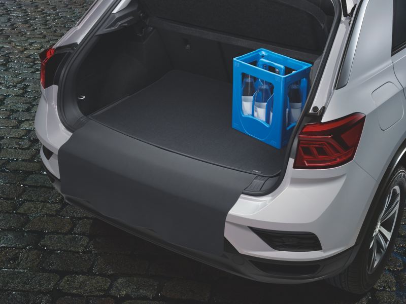 Reversible luggage compartment mat