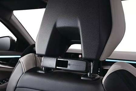 Multifunction holder on headrest