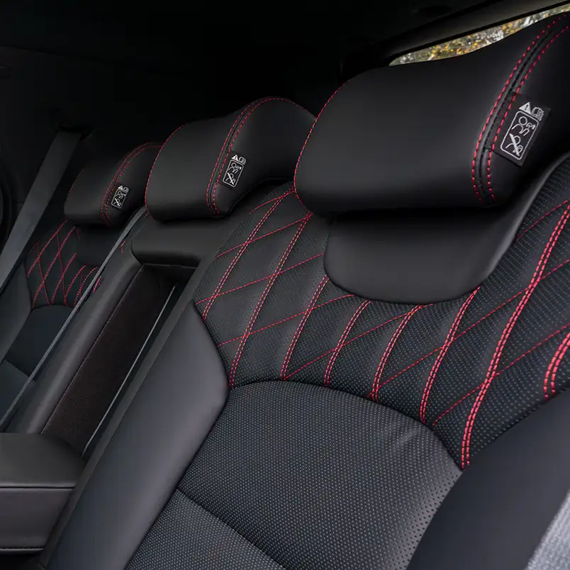 Premium leather seats with red stitching Image