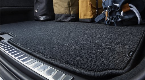 Reversible textile/plastic load compartment mat