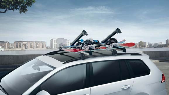 Comfort ski and snowboard holder