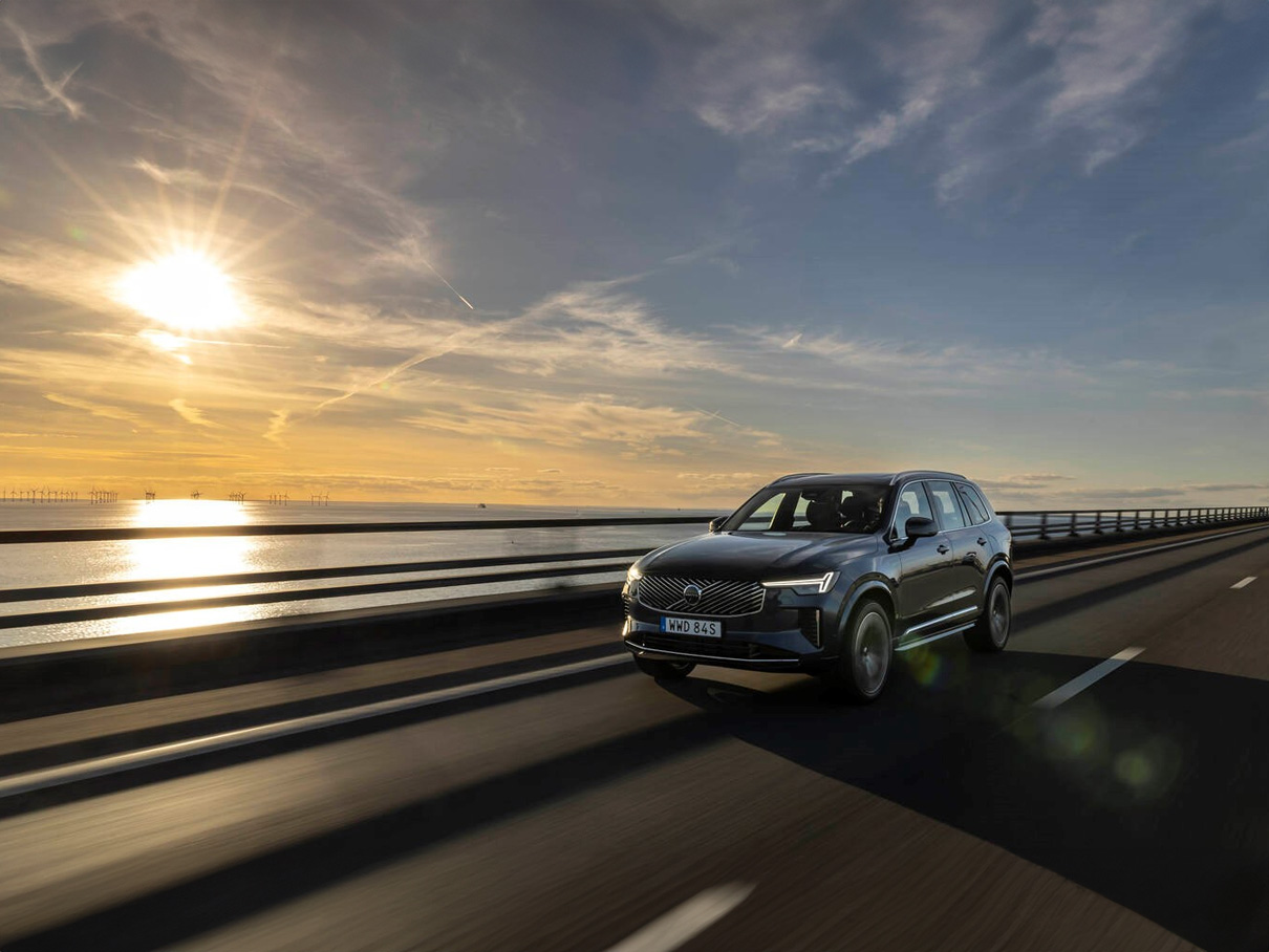 Volvo driving in the sunset