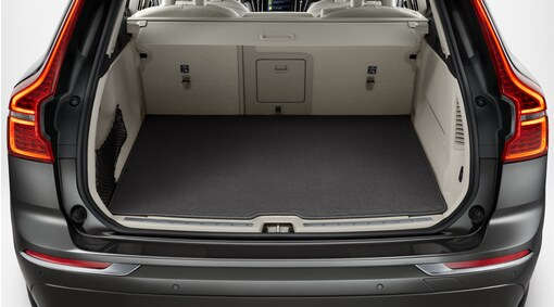 Reversible load compartment mat.
