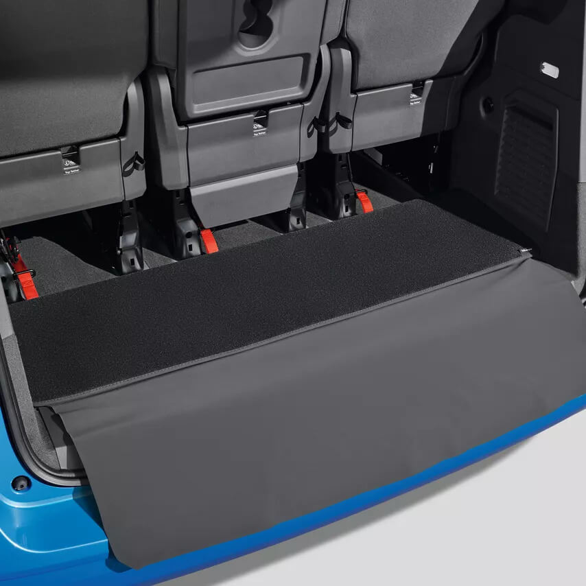 Reversible luggage compartment mat