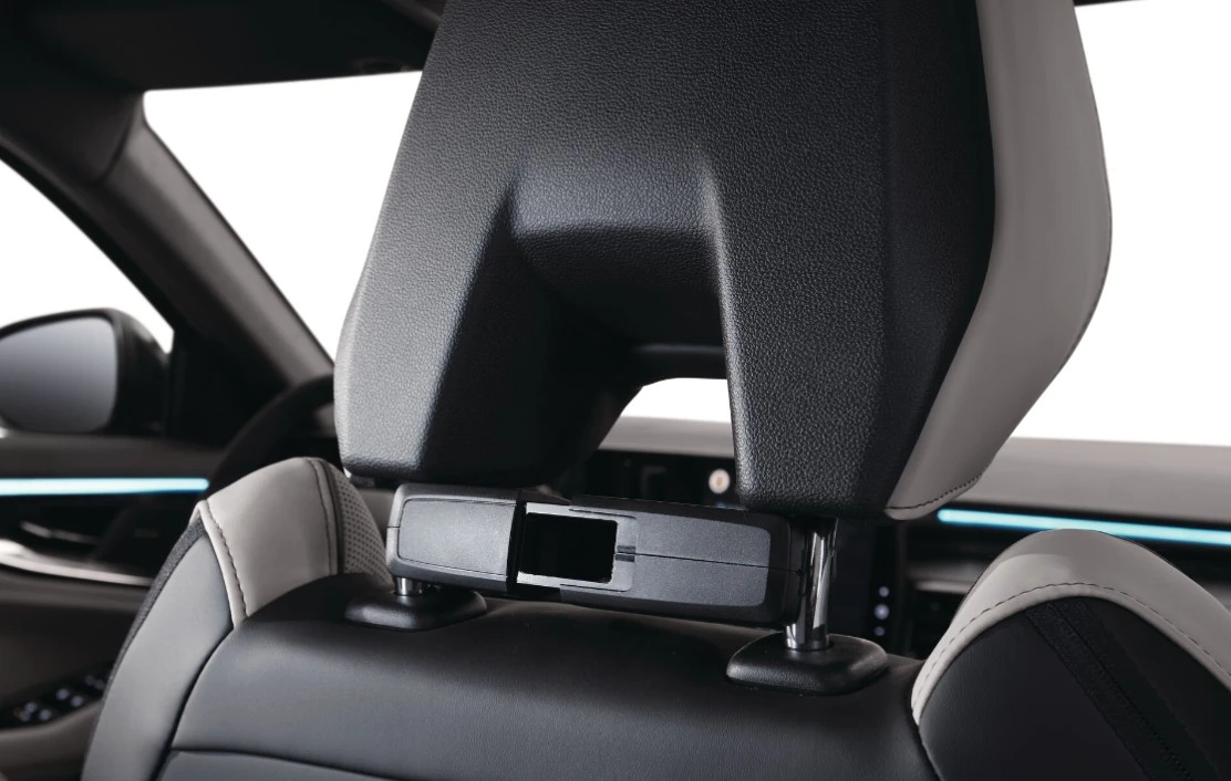 Multifunction holder on headrest