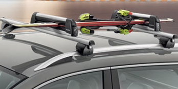 Lockable ski and/or snowboard carrier